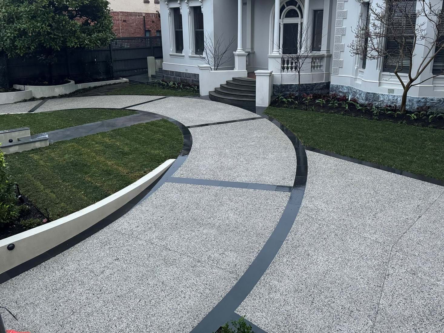 Exposed aggregate with custom bluestone border